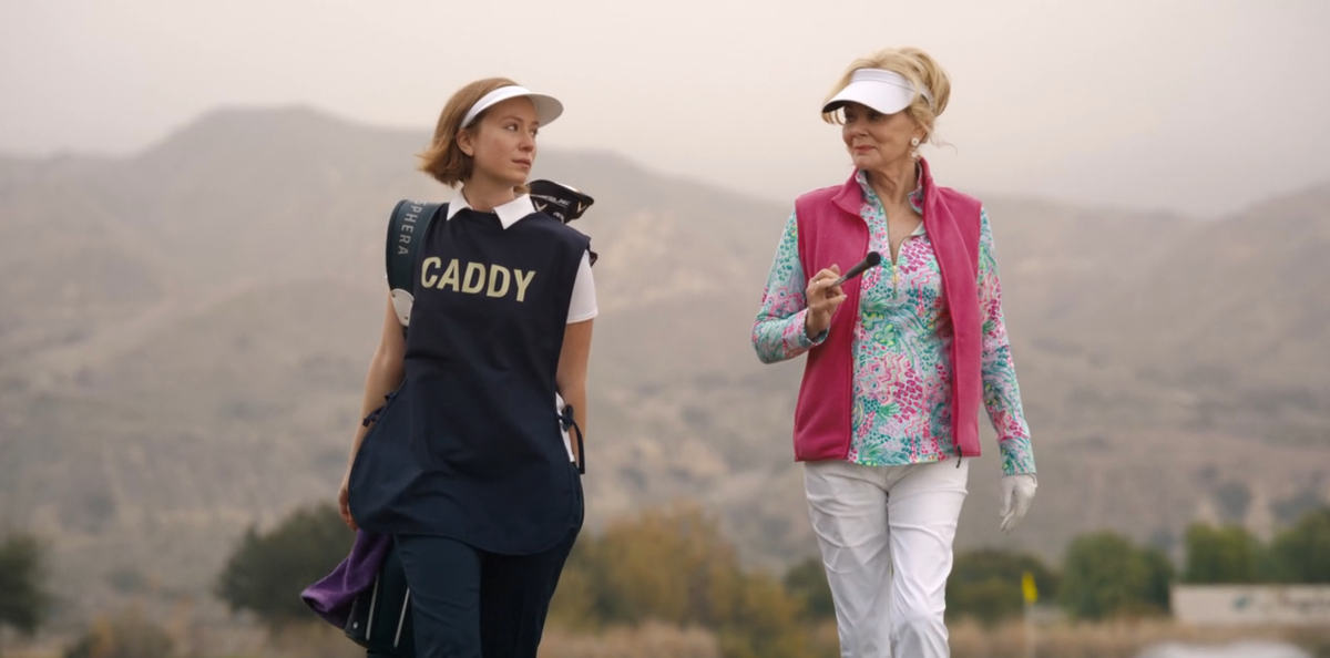 Ava and Deborah in their golf gear in Hacks.